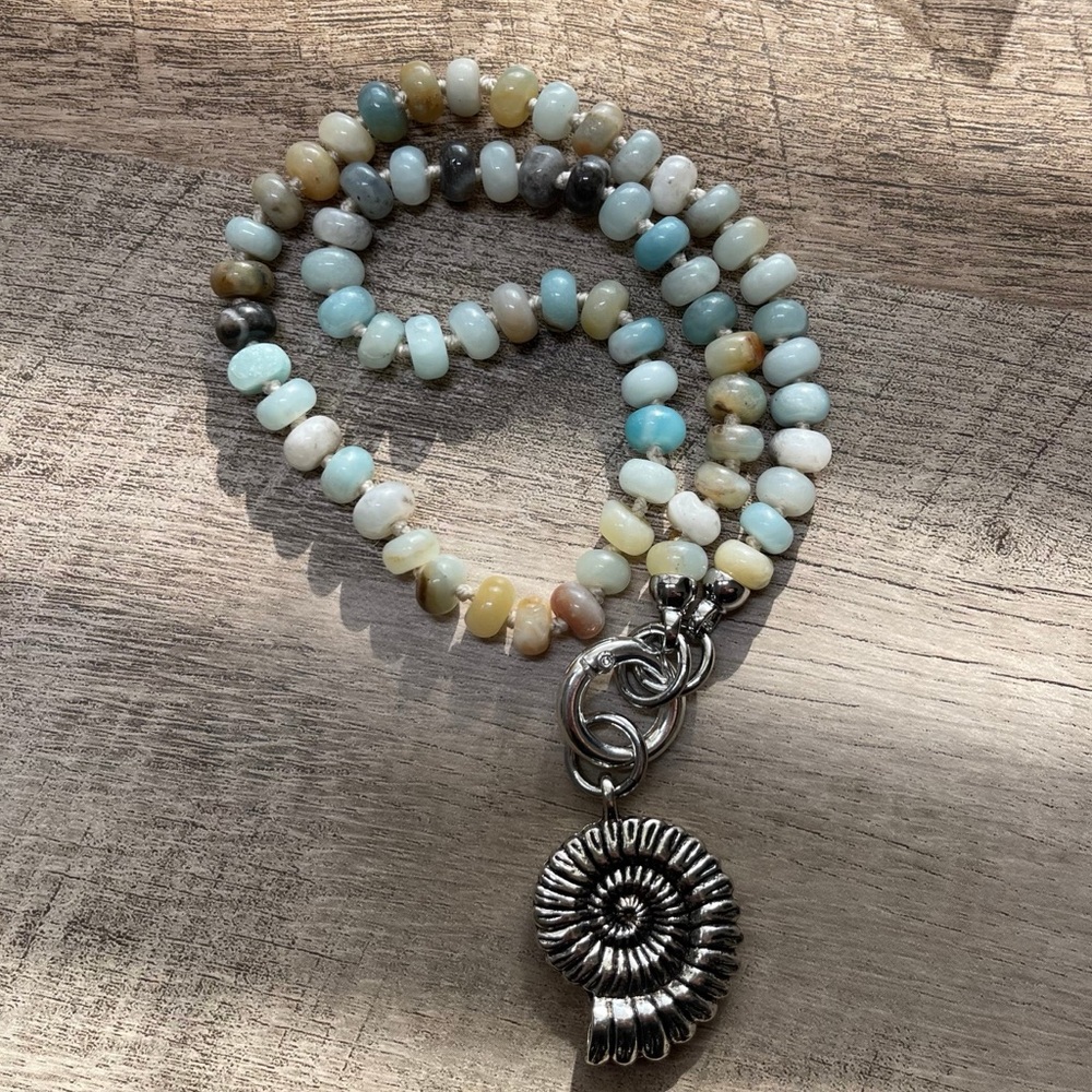 Nautilus Necklace: Handknotted Amazonite beads w a tarnish free silver Nautilus